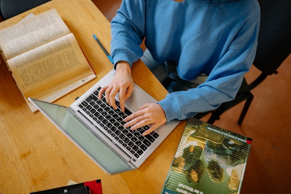 Year 12 student checking their ATAR results on a laptop